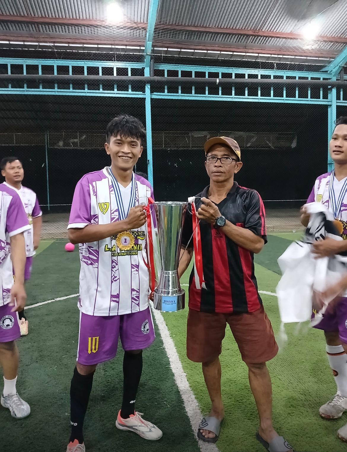 OLA futsal trophy presentation
